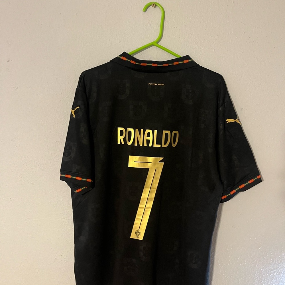 Puma Men's Black and Gold Jersey